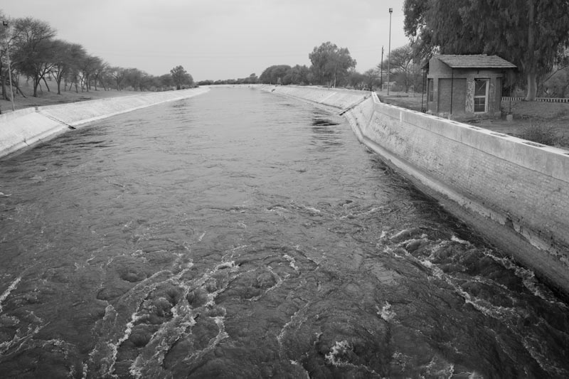 Main Canal of the Indira Gandhi Canal Project in Bikaner district, Rajasthan. This project has transformed many barren desert stretches into productive fields, with  multiple cropping